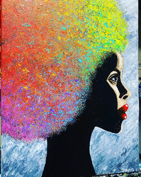A lady with colorful Afro